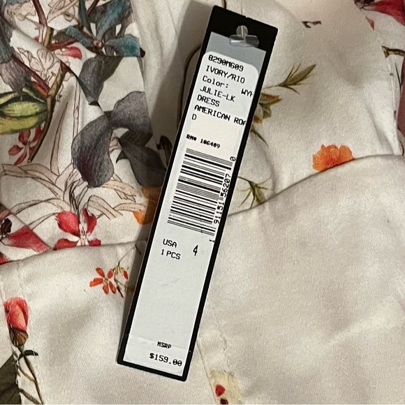 Tahari Arthur S Levine Dresses Color Ivory/Rio White Floral Julie Dress Side 4. - Picture 16 of 16